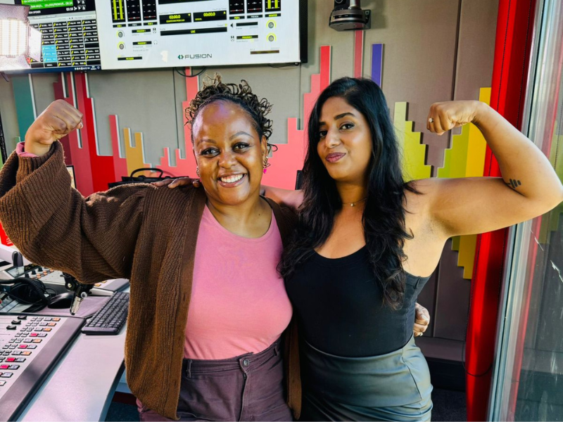 Carol Ofori poses with Amelia Krishna at the East Coast Radio studios