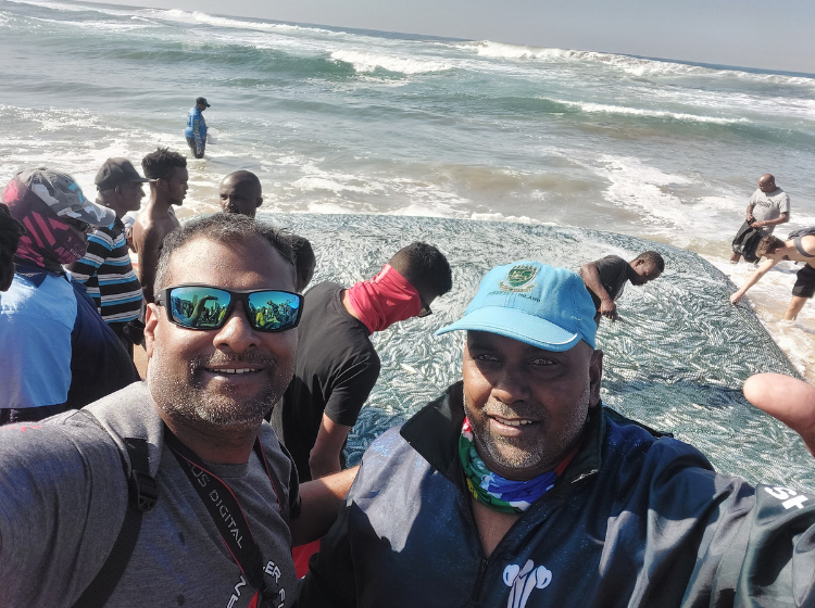 Vinesh Soogreem and Jace Govender on the beach where sardines are being netted in KZN